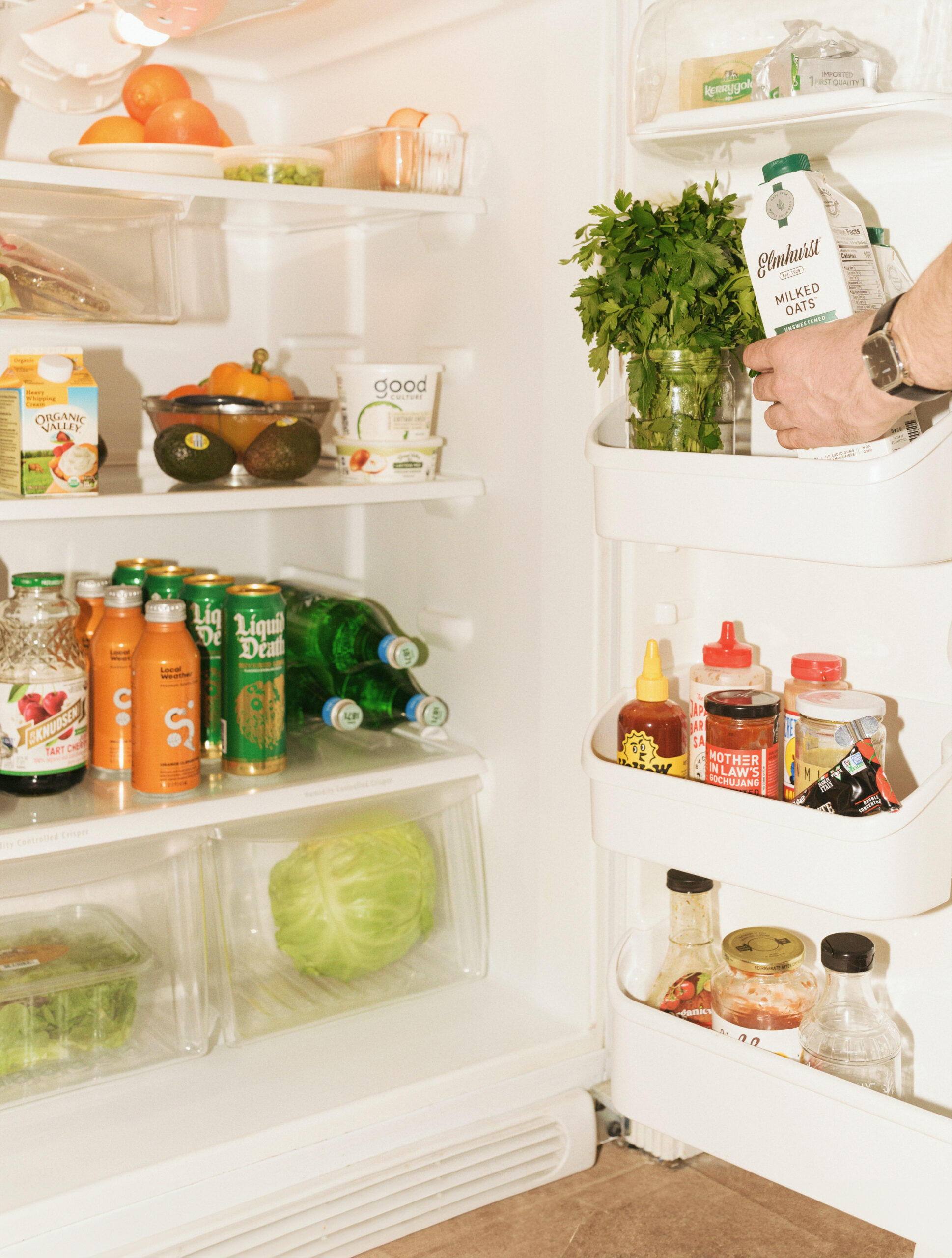 a fridge full of product that we carry in at the Co-op, ranging from local produce to dairy-free and organic drinks